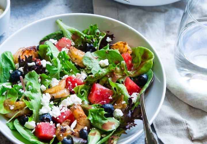 vegetable salad on white ceramic bowl