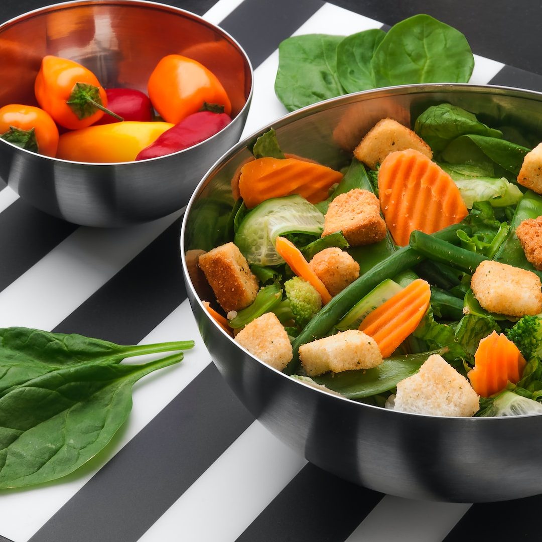 sliced vegetables on stainless steel bowl